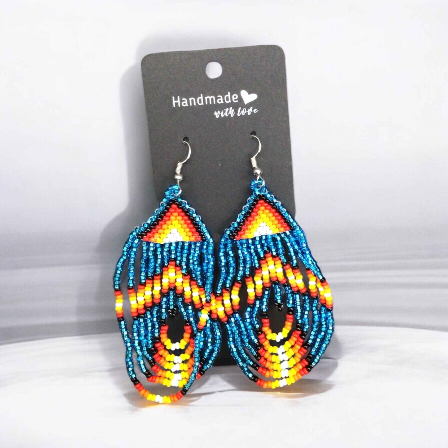 Light Blue Swoop Beaded earrings