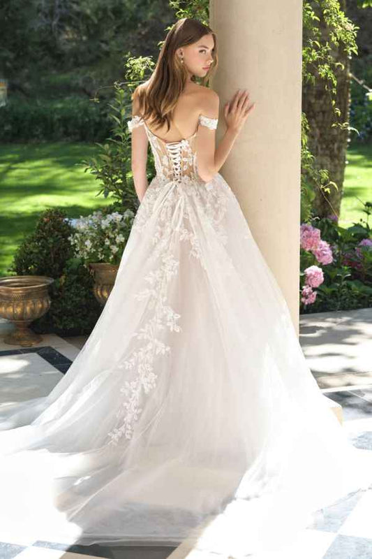 Off-the-shoulder illusion neckline with floral appliqué