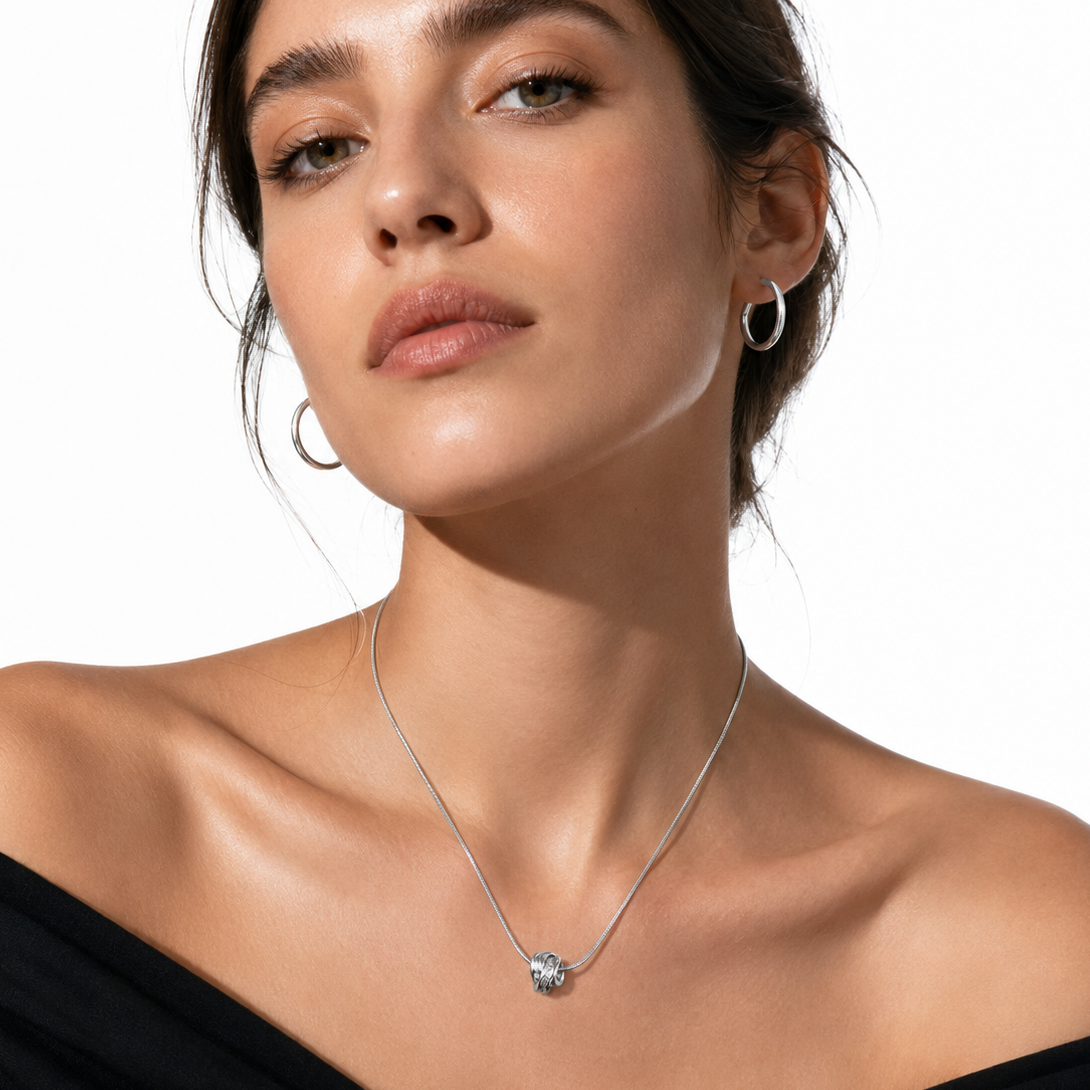ALEKI Silver (White Gold): Sculptural Knot Pendant Necklace