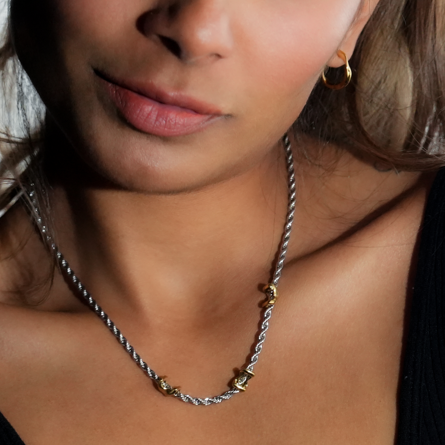 COSMINA Mixed Metals: Silver Rope Chain Necklace with Triple Mini Gold Criss-Cross Charms
