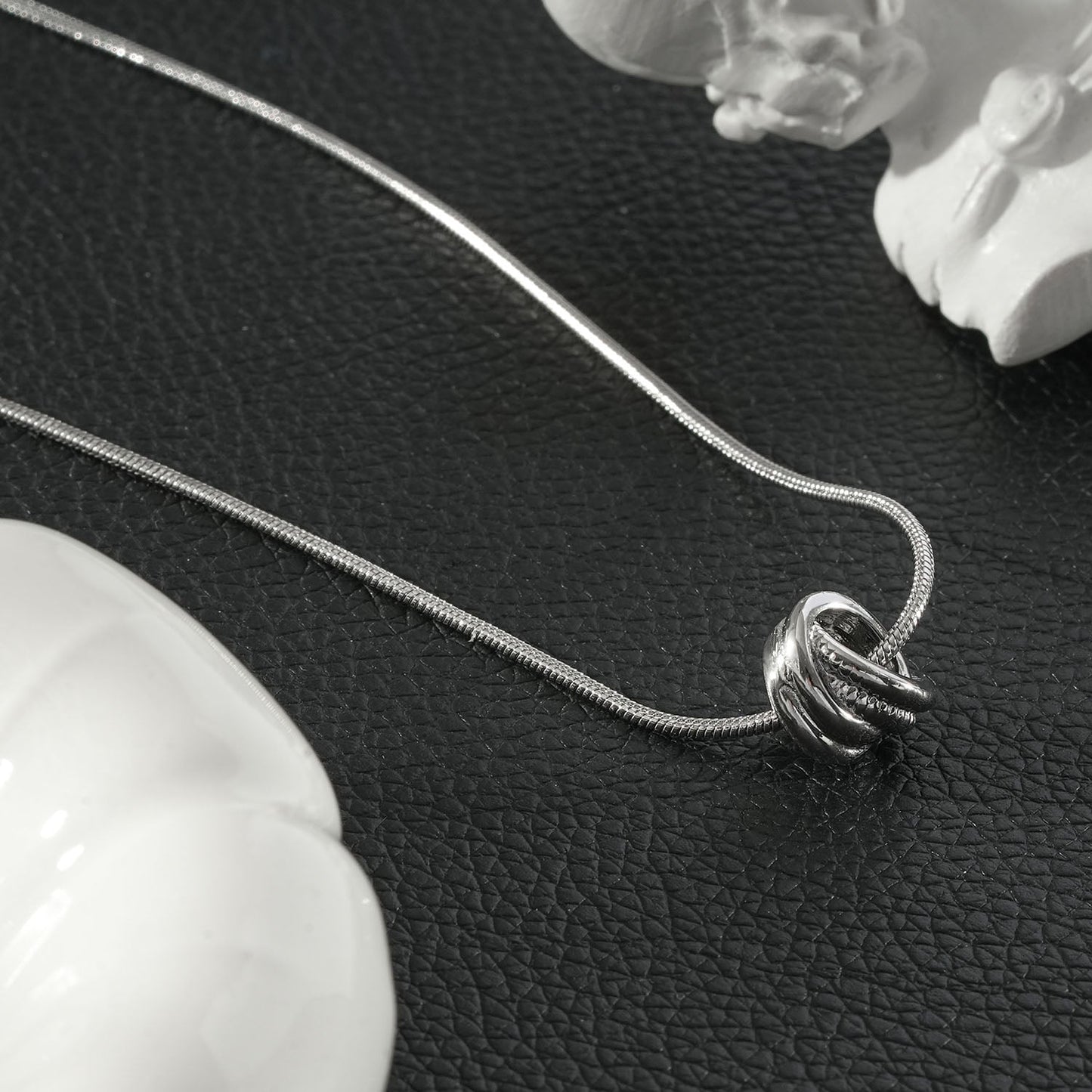 ALEKI Silver (White Gold): Sculptural Knot Pendant Necklace