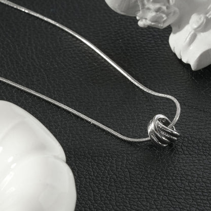 ALEKI Silver (White Gold): Sculptural Knot Pendant Necklace