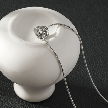 ALEKI Silver (White Gold): Sculptural Knot Pendant Necklace
