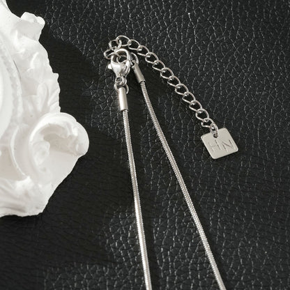 ALEKI Silver (White Gold): Sculptural Knot Pendant Necklace