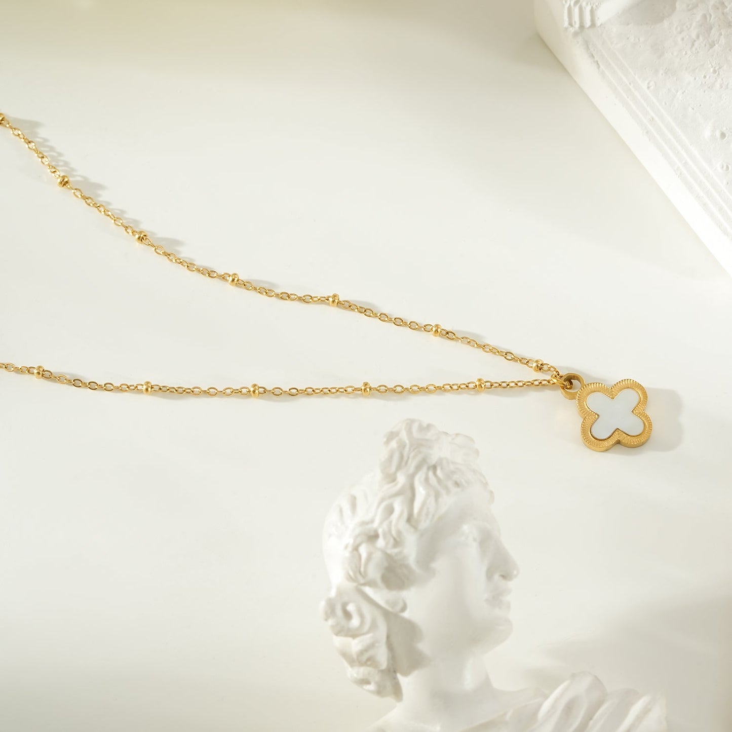 LULLA Gold: Natural Shell Clover Pendant Beaded Chain Necklace