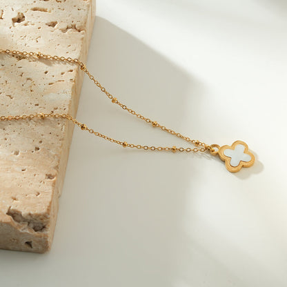 LULLA Gold: Natural Shell Clover Pendant Beaded Chain Necklace