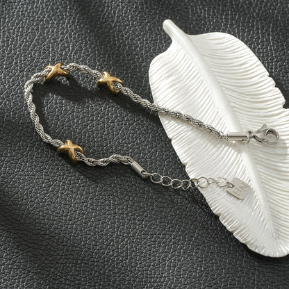 DRAGOSA Mixed Metals: Silver Rope Chain Bracelet with Triple Mini Gold Criss-Cross Charms