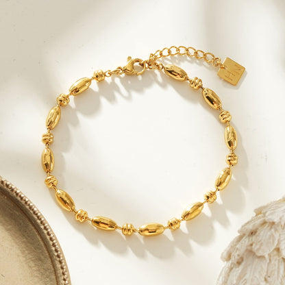 ADIATA Gold: Polished Oval Bead Bracelet – Sculpted Statement Jewellery