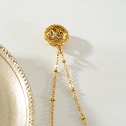 SALAMASINA Gold: Crystal Interwoven Knot Pendant Necklace