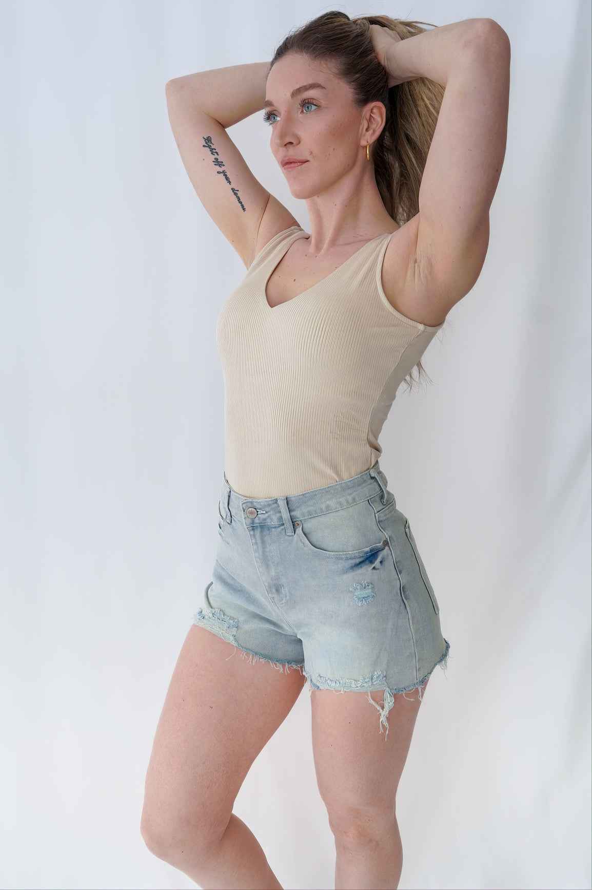 Bodysuit en rib col en V beige